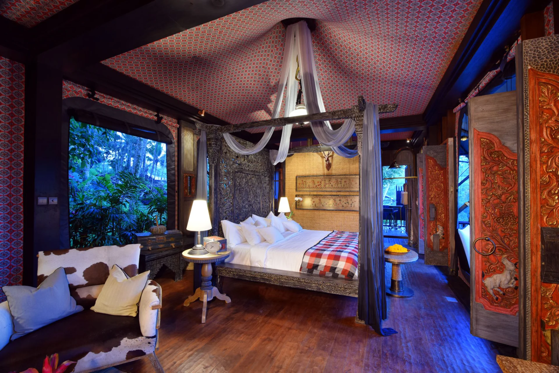 Interior of a luxury tented-retreat bedroom at Capella Ubud